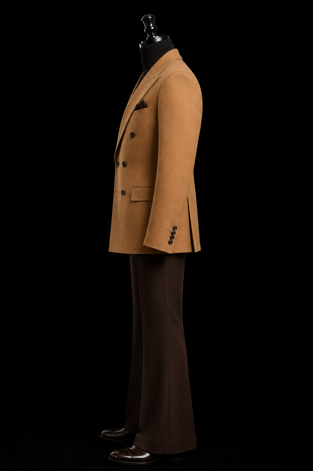 Camel toned double-breasted blazer paired with deep brown flared trouser